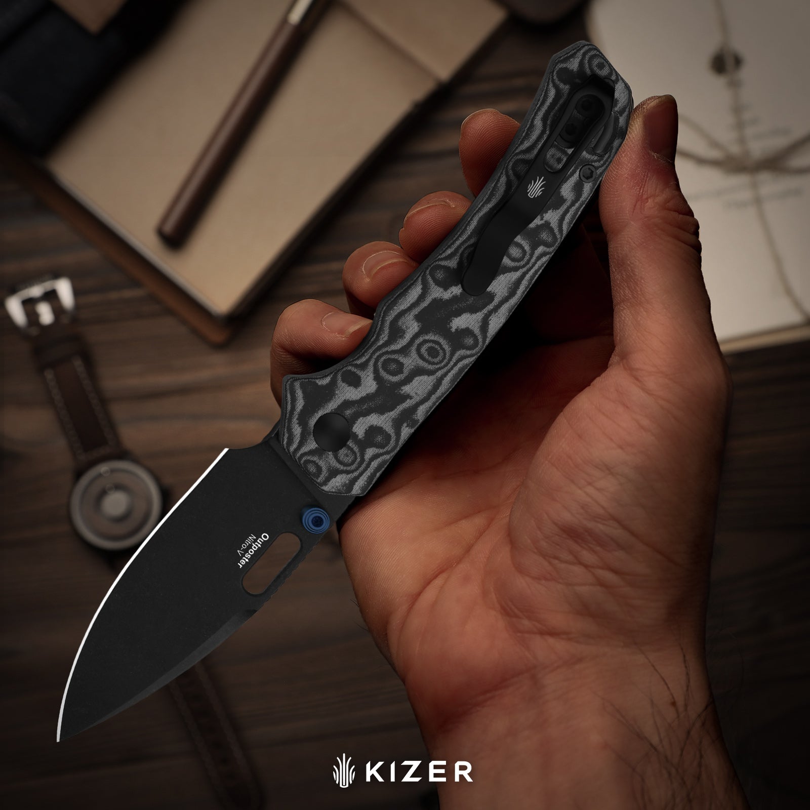 Outposter | Kizer Clutch Lock™ | Vortex Pattern Micarta | Nitro-V+PVD Coating | KizerV™ 3802CDA2