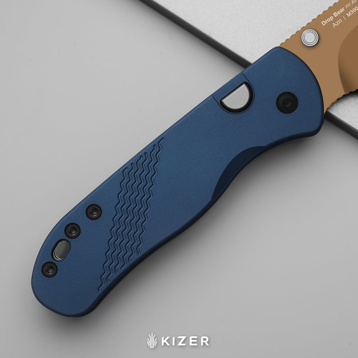 Drop Bear 292 AirTi (Left-Handed) | Kizer Button Liner Lock™ | M390 + Sunset PVD Coating | Blue Milled Aluminum | KizerB™ 3619.292BD5